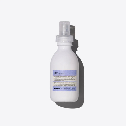 SU Milk leave-on spray cream for hair with UV protection, keeping hair soft and light during sun exposure.