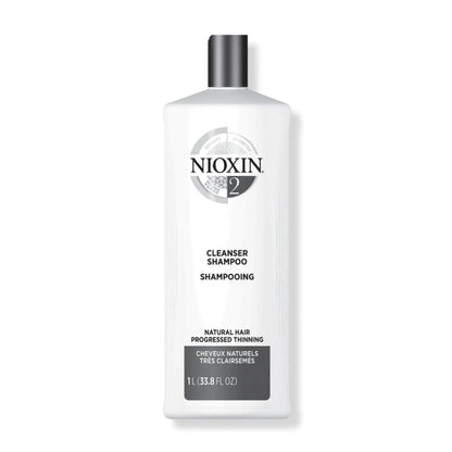 Nioxin Cleanser Shampoo System 2 for fine, progressed thinning hair, detoxifies and removes buildup, 33.8 fl oz bottle.