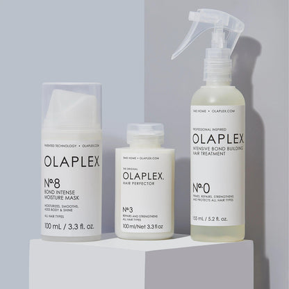 Olaplex Bond Treatment System featuring Nº.0, Nº.3, and Nº.8 for intensive hair repair and moisture.