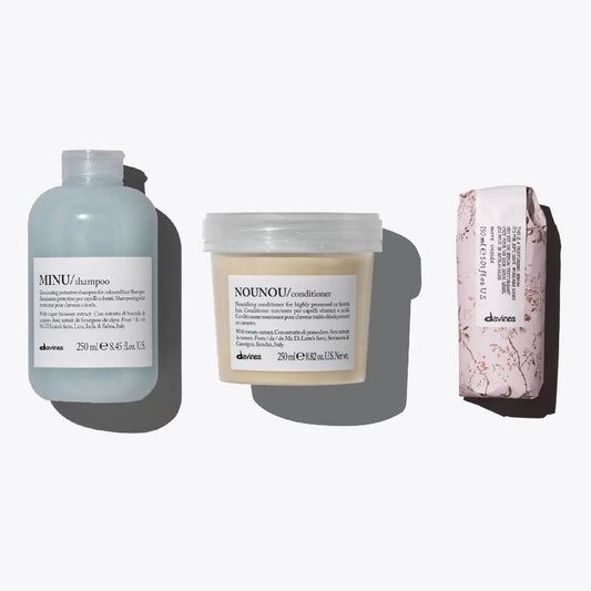 Davines The Nourished Color Set featuring MINU Shampoo, NOUNOU Conditioner, and a Texturizing Serum for vibrant hair care.