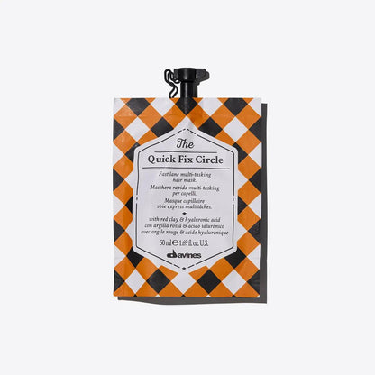 Davines The Quick Fix Circle multi-tasking hair mask pouch with a checkered design, ideal for quick hydration and detangling.