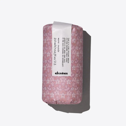 Floral-patterned Davines shampoo bar in eco-friendly packaging, 250 ml