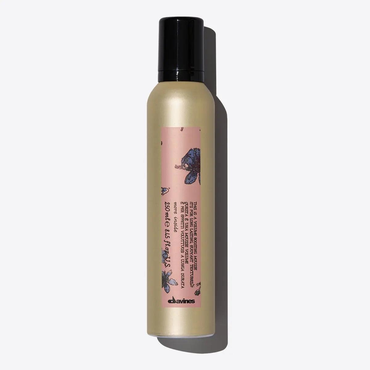 Volume-boosting mousse in a sleek bottle, perfect for adding airy volume to all hair types. Creamy, snow-like texture.