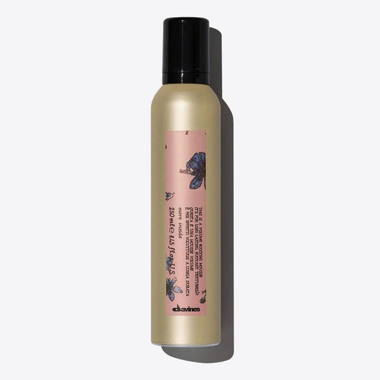 Volume-boosting mousse in a sleek bottle, perfect for adding airy volume to all hair types. Creamy, snow-like texture.