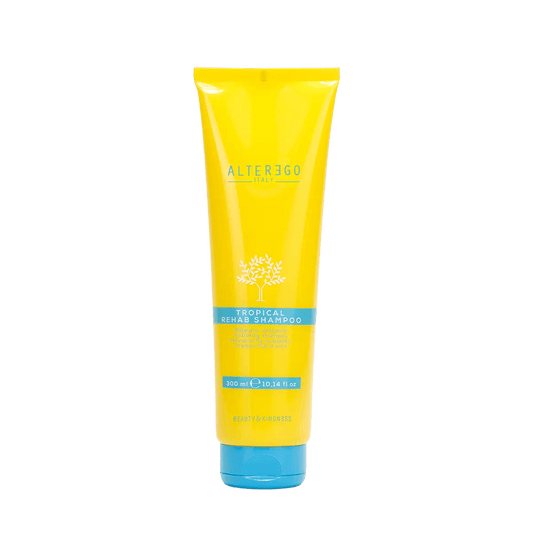 Tropical Rehab Shampoo by Alter Ego in a bright yellow tube, designed for gentle cleansing and hydration after sun exposure.