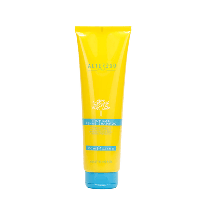 Tropical Rehab Shampoo by Alter Ego in a bright yellow tube, designed for gentle cleansing and hydration after sun exposure.