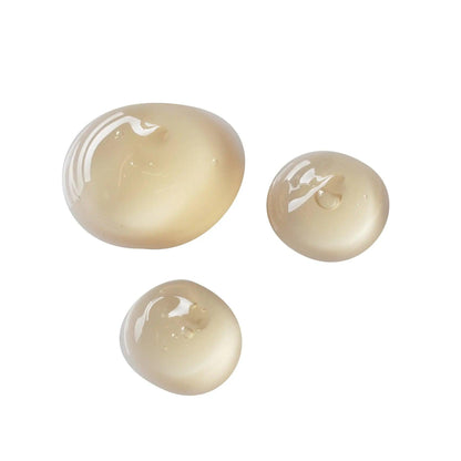 Under eye gel drops showcasing a smooth, transparent texture, ideal for reducing puffiness and dark circles.