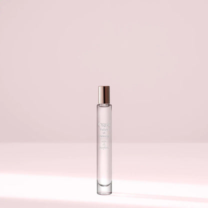 Valley of Flowers Eau De Parfum travel size bottle on a soft pastel background.