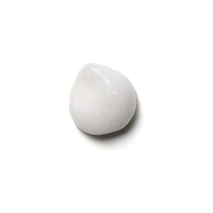 White foam texture of Moroccanoil® Volume Root Boost, designed for root lift and added hair volume.