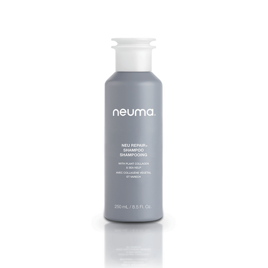 250 mL bottle of Neu Repair Shampoo with plant collagen, revitalizing and strengthening damaged hair.
