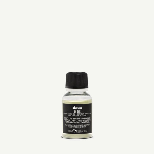 Oi Oil 20mL bottle by Davines, a trial size product free with $75 online purchase, while supplies last.